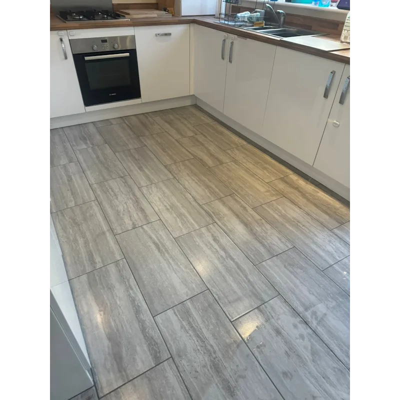 Kitchen with grey wood-effect floor tiles